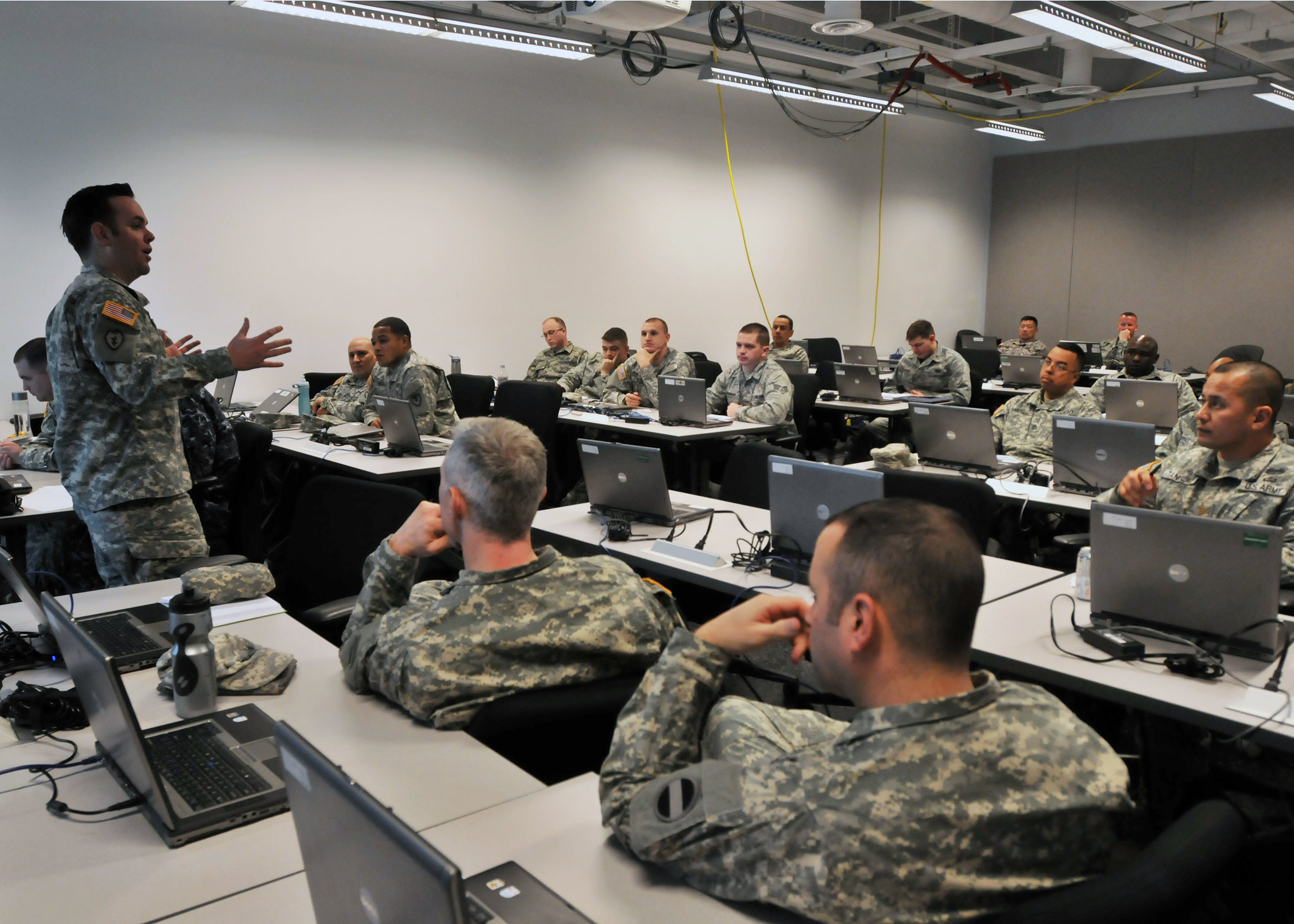 Background photo used for header by Classroom Training U.S. Army Capt. Matthew Basil, 16th Mobile Public Affairs Detachment, conducts media relations training Jan. 15 during the Operational Contract Support Joint Exercise 2014 on Fort Bliss. More than 500 military and civilian contracting professionals from around the world are participating in OCSJX-14 from Jan. 5-31. Photo by Staff Sgt. Richard Andrade.